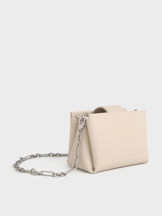 BOXED Charles & Keith Micro Bosie Patent Top Handle Pouch - Oat
