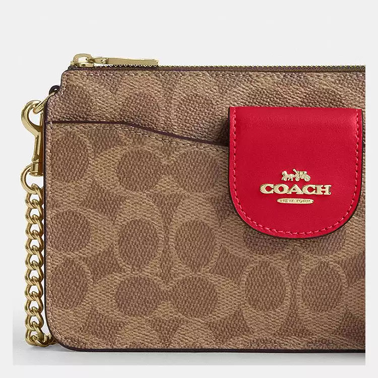 Coach Poppy signature canvas cross body bag