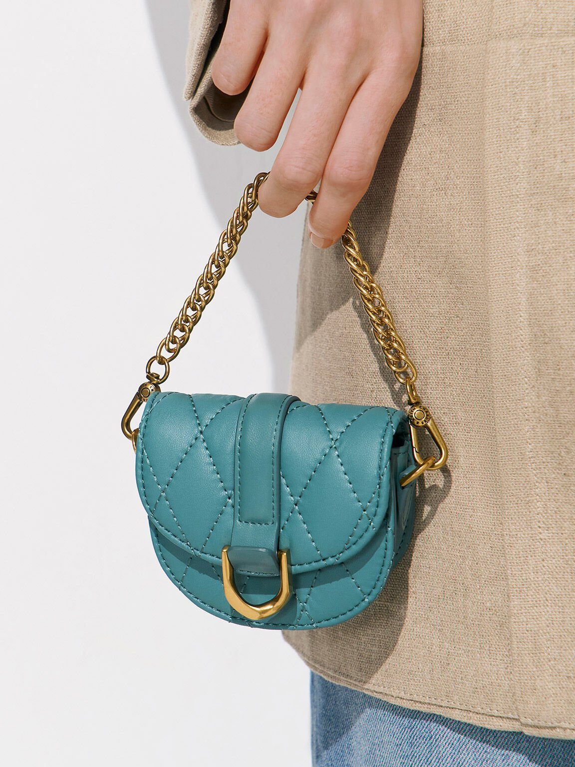 Charles & Keith Micro Gabine Quilted Saddle Bag - Teal