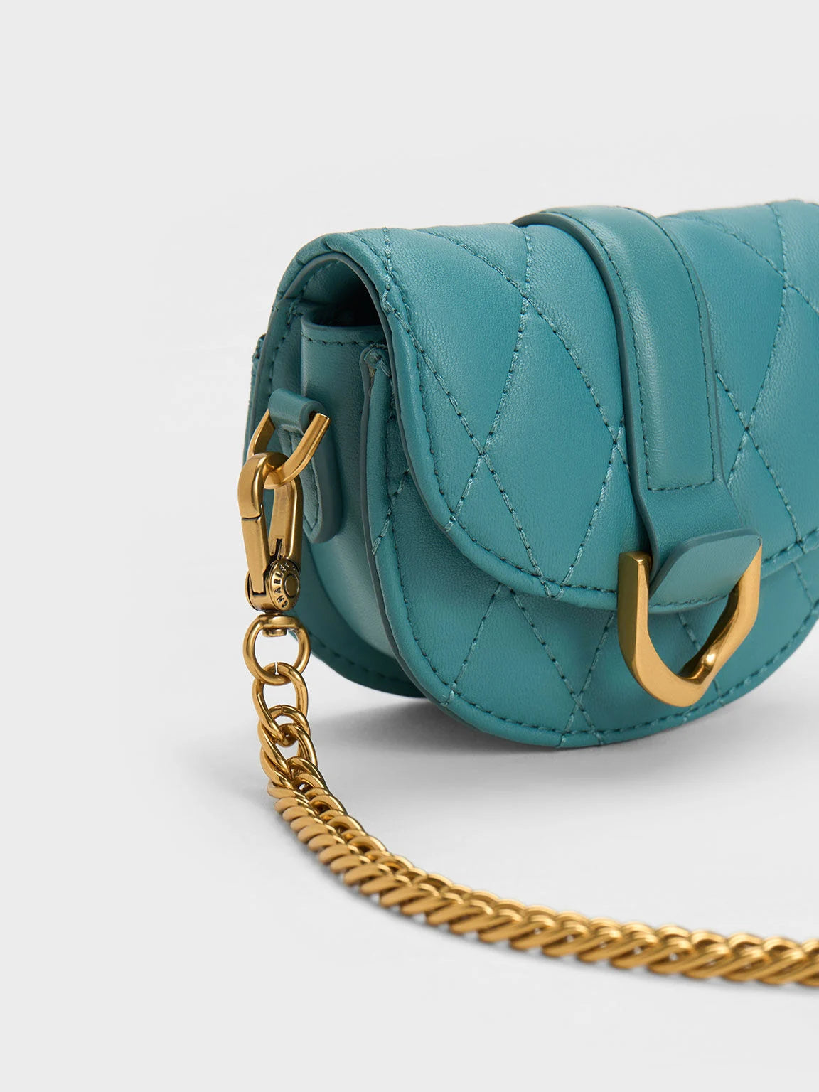 Charles & Keith Micro Gabine Quilted Saddle Bag - Teal