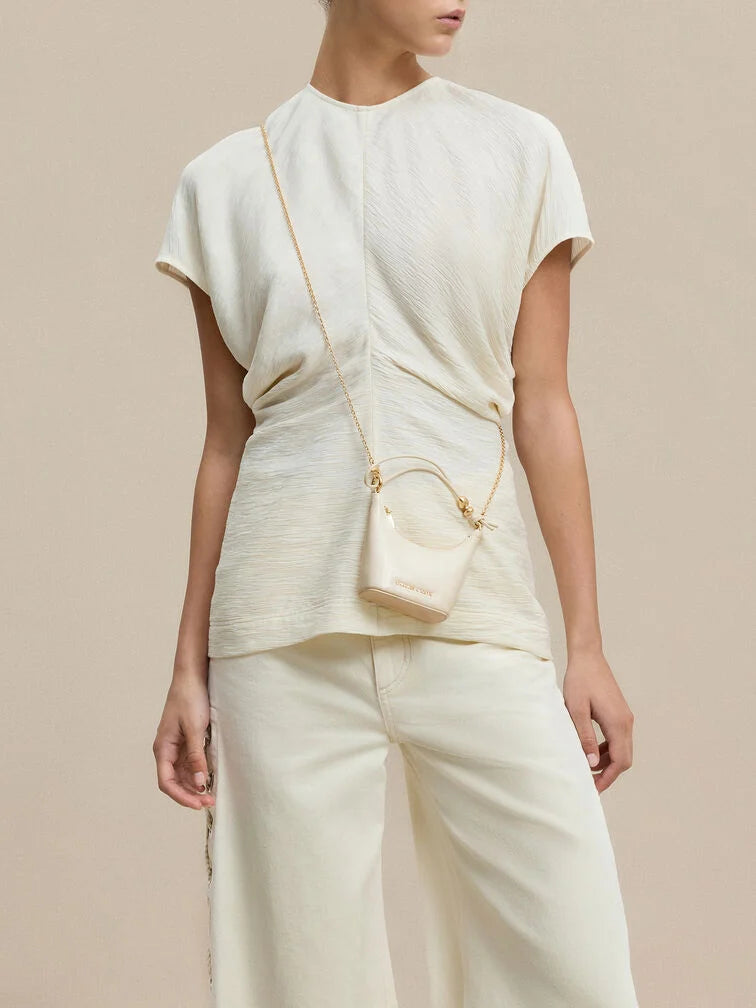 BOXED Charles and Keith Micro Augustine Eel-Effect Chain-Handle Bag - Cream
