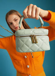 Charles and Keith Quilted Round Pouch crossbody bag- Mint Green