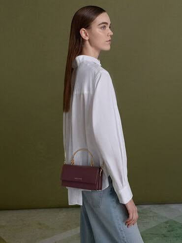 PREORDER BOXED Charles and Keith Kristine Sculptural-Handle Long Wallet - Wineberry red