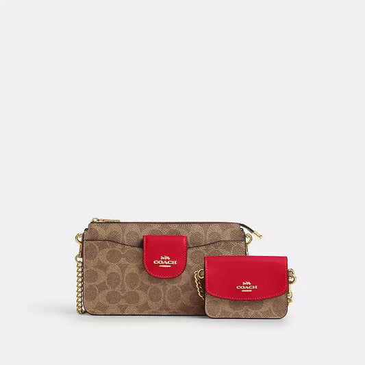 Coach Poppy signature canvas cross body bag