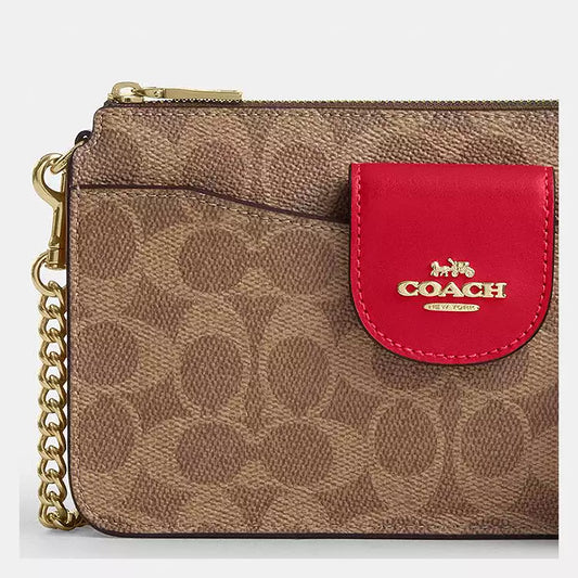 Coach Poppy signature canvas cross body bag