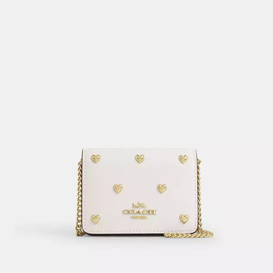Coach Micro Mini crossbody with heart rivets - white