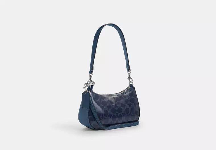 Teri Mini Crossbody Bag In Signature Canvas-Blue