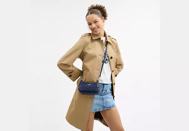 Teri Mini Crossbody Bag In Signature Canvas-Blue